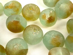 lot 242 image: 24 Antique Round Sea Glass African Trade Beads and 3 Lost Wax Cast Bronze Bells