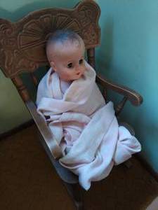lot 488 image: Doll & Rocking Chair