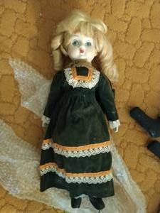 lot 491 image: Porcelain Doll