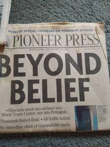 lot 57 image: Three Newspapers Featuring Historic Events