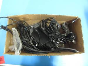 lot 21 image: Box of Misc power supplys & cables