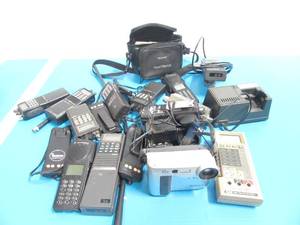 lot 24 image: Lot of Misc Hand Held Radios, Sony Camera ect (may or may not be working)