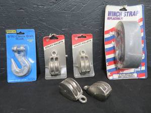 lot 35 image: PULLEYS, WINCH STRAP, AND GRAB HOOK