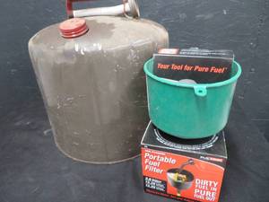 lot 52 image: GAS CAN AND FUEL PURIFIER