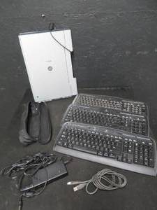 lot 69 image: 16 CANNON PORTABLE COPIER, 3 KEYBOARDS, CHARGER & CASE