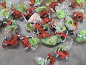 lot 80 image: BUCKET OF  CAST IRON WATER LINE TAPS PLUS