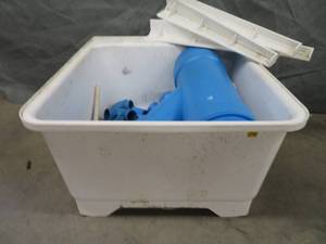 lot 91 image: PLASTIC UTILITY TUB FULL OF BLUE PVC PIPE FITTINGS