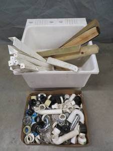 lot 93 image: PLASTIC UTILITY TUB FILLED WITH PVC, DRAIN PEICES,CUPPLERS