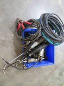 lot 118 image: BOX FULL OF ASSORTED GREESE GUNS, AIR HOSE, GARDEN HOSE, AND JUMPER CABLES