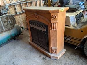 lot 68 image: Gas Fireplace in nice wood Mantle