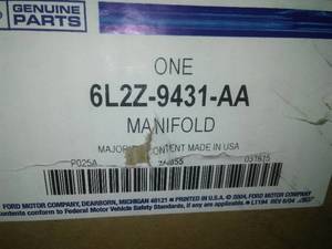 lot 74 image: Ford 6L2Z-9431-AAExhaust Manifold Assembly 2006-2008 Explorer, Trac, Mountaineer Select Models