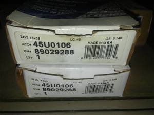 lot 128 image: (2) ACDelco 89029288 - ACDelco U-Joints