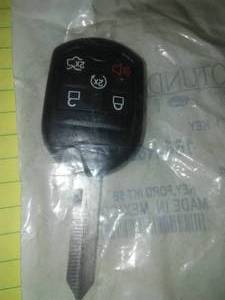 lot 131 image: New Uncut 5 Button 164-R8000 Remote Replacement Key Explorer, Flex, Taurus, MKX