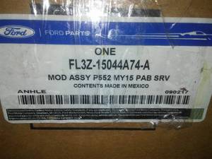 lot 215 image: Passenger Inflator Module - Ford (FL3Z-15044A74-A) F150 (2015-2019)