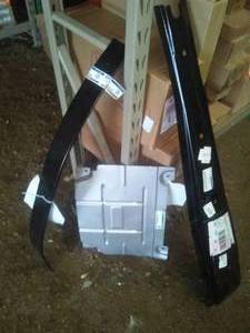 lot 305 image: Front Deflector - Ford (DG9Z-6P013-D)  Fusion, MKZ, Edge (2020) and leaf spring.