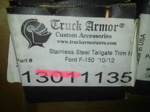 lot 358 image: Stainless Steel Tailgate Trim. F 150 2010-2012
