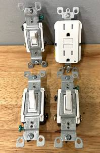 lot 88 image: Lot of Light Switches and GFCI Tamper Resistant Outlet