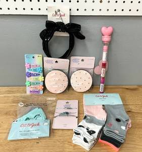 lot 84 image: Lot of Girls Hairs Accessories, Socks, Masks and Lipsmackers