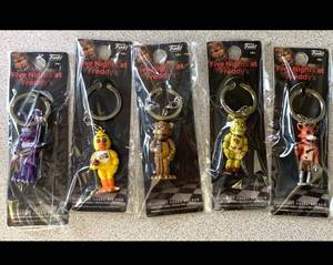 lot 101 image: Funko FNAF Five Nights at Freddys Set of 5 Collectible Figure Keychains