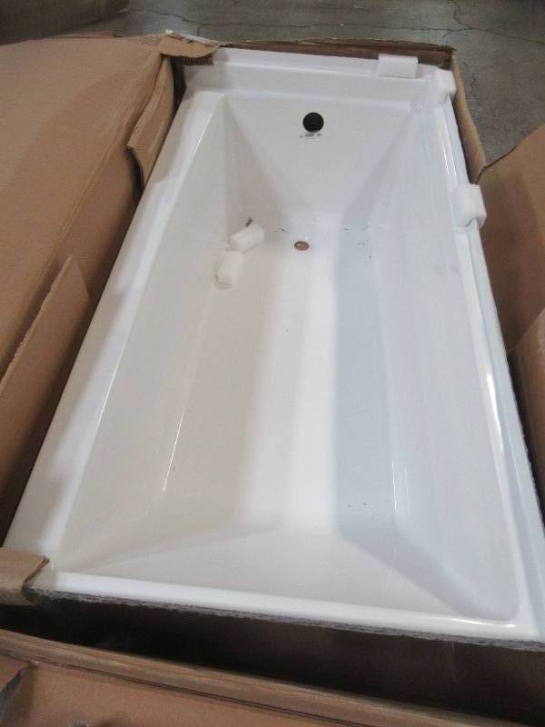 lot 525 image: Aquatic Capistrano 60 x 30 x 20 58 Acrylx Applied Acrylic Left Drain Rectangular Apron Front Non-Whirlpool Bathtub in White - Crack on tile flange RH Corner. Cracked Wainscot LH Back Corner.