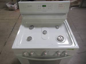 lot 206 image: Frigidaire Gas Range with Self-Cleaning Oven in White FFGF3054TW