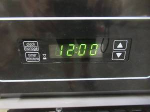 lot 207 image: Summit Appliance 24 in. Single Gas Wall Oven in Black TTM7212DK