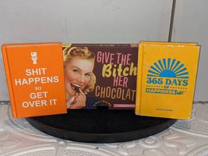 lot 150 image: Small Books To Lighten Your Mood