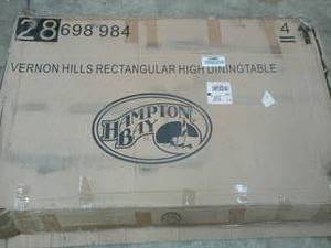 Vernon Hills Rectangular High Patio Dining Table by Hampton Bay Missing screws and parts Customer Returns See Pictures