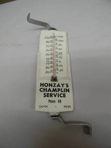 lot 14 image: RARE AWESOME PIECE - VINTAGE HONZAYS CHAMPLIN SERVICE OLIVIA MINN THERMOMETER WITH MOUNTING BRACKETS - APPROX 7 BY 3 - SEE PICTURES