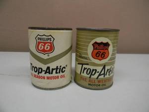 lot 45 image: VINTAGE PHILLIPS 66 TROP-ARTIC ALL SEASON & ALL WEATHER OIL - OIL CAN ADVERTISING COIN BANKS - NICE - GREAT PIECE - SEE PICTURES