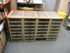 lot 16 image: VINTAGE STORAGE CABINET - 28 GLASS FRONT DRAWERS (MISSING 1 DRAWER) VERY COOL SOLID OLD HEAVY PIECE - APPROX 29TALL 55WIDE 24DEEP - SEE PICTURES