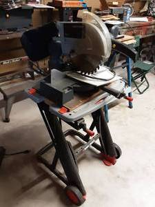 lot 2 image: Sears Craftsman 3 HP Compound Miter Saw & Manual With Black & Decker Stand
