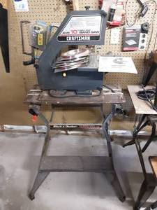 lot 4 image: Sears Craftsman 10 Direct Drive Band Saw With Manual, Extra Blades and Black & Decker Workmate Stand