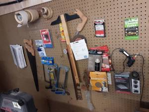 lot 6 image: Lot Of Items On Peg Hooks Hand Saws, Sand Paper, Tape, Hardware & Misc.