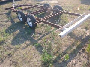 lot 12 image: Home Made 16 Trailer Frame With Tandem Axles and New Tires