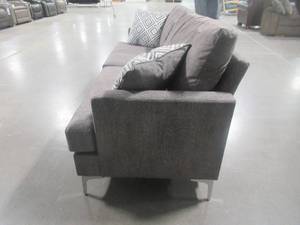 lot 310 image: Signature Design by Ashley Arcola RTA Sofa 82604S1