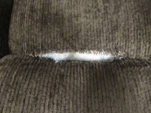 lot 311 image: Coaster Furniture Gordon Motion Sofa 601461 - FABRIC IS SLIGHTLY TORN