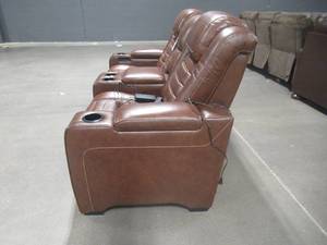 lot 317 image: Signature Design by Ashley Backtrack Power Reclining Loveseat with Console U2800418