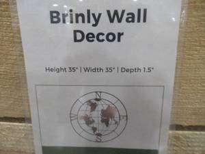 lot 657 image: Signature Design by Ashley Brinly Wall Decor A8010174