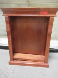 lot 241 image: Naples 25 in. W x 31 in. H x 8 in. D Framed Surface-Mount Bathroom Medicine Cabinet in Warm Cinnamon.