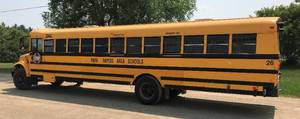 lot 3 image: 1999 International 3800 DT466E 77-Passenger Bus #26