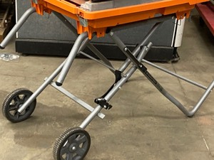lot 41 image: Ridgid R40921 Portable 115Volt Tile Saw With Portable Saw Stand With Slide Table