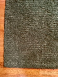 lot 93 image: Woolmark Forest Green Rug