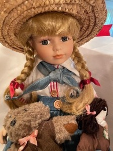 lot 107 image: 3 Pretty Porcelain Dolls