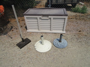lot 38 image: Patio Storage Box & Umbrella Stands