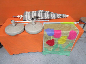 lot 100 image: Patio Umbrella & Flag