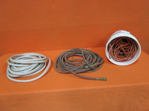 lot 104 image: Garden Hose, Air Hose, Extension Chord
