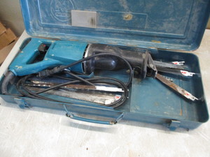lot 50 image: Makita Sawzall and blades