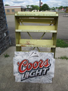 lot 127 image: Sunshine Bisquit Display Rack and Coors Beer Sign