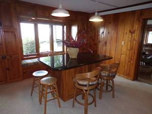 lot 3 image: Granite Dining Room with Counter base with Chairs